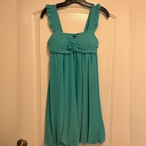 Mini flowy dress with flower detail